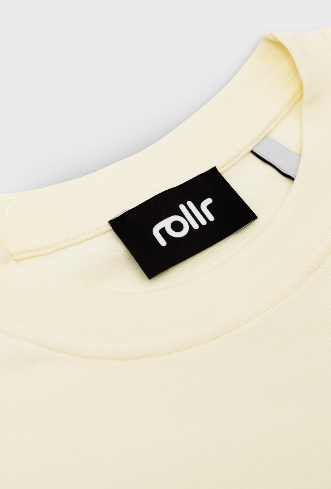 rollr vanilla cream box fit tee made from french terry 100% organic cotton fabric with rollr logo on black label