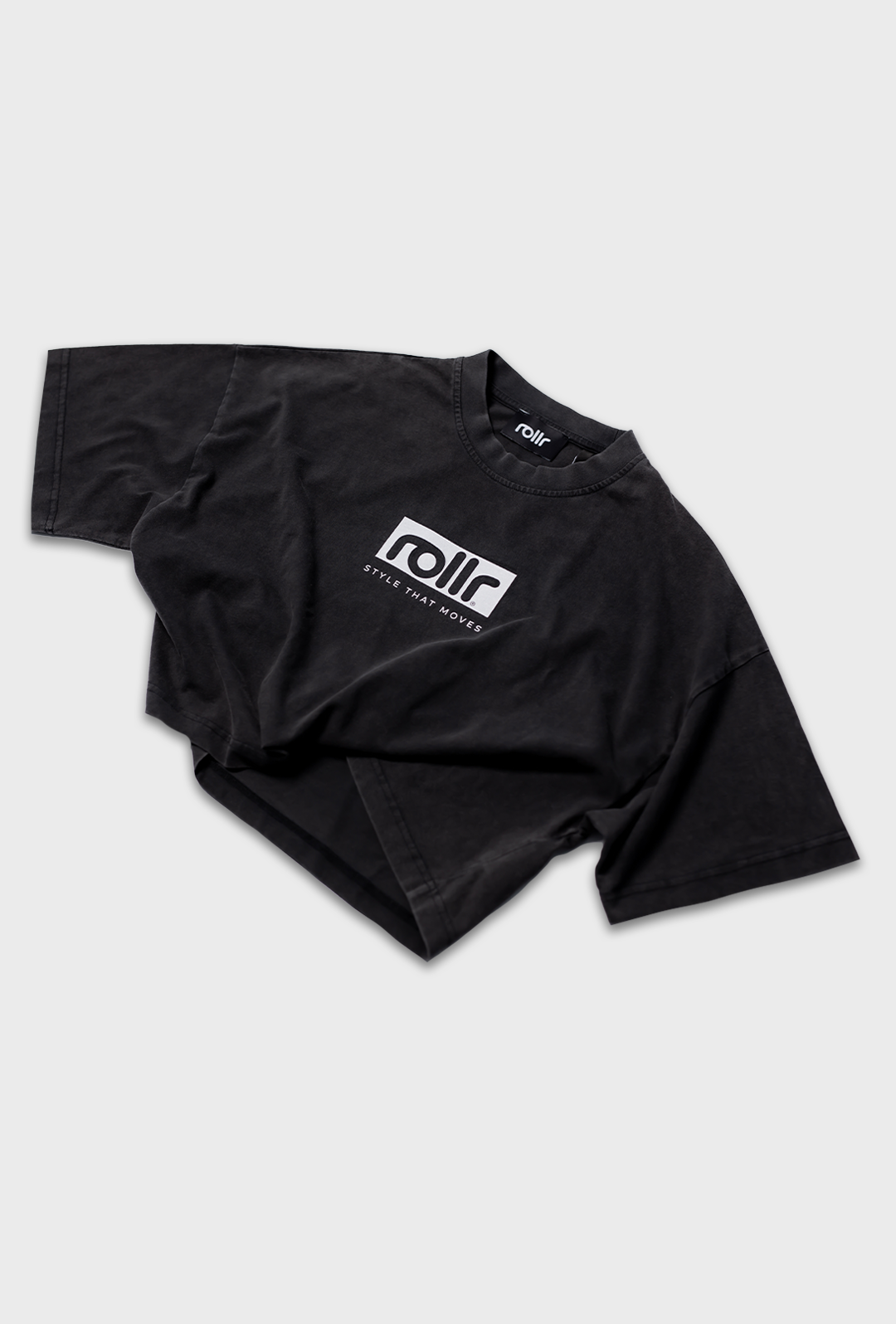 rollr womens cropped vintage black cropped tee by roller clothing, with rollr logo and style that moves printed tagline