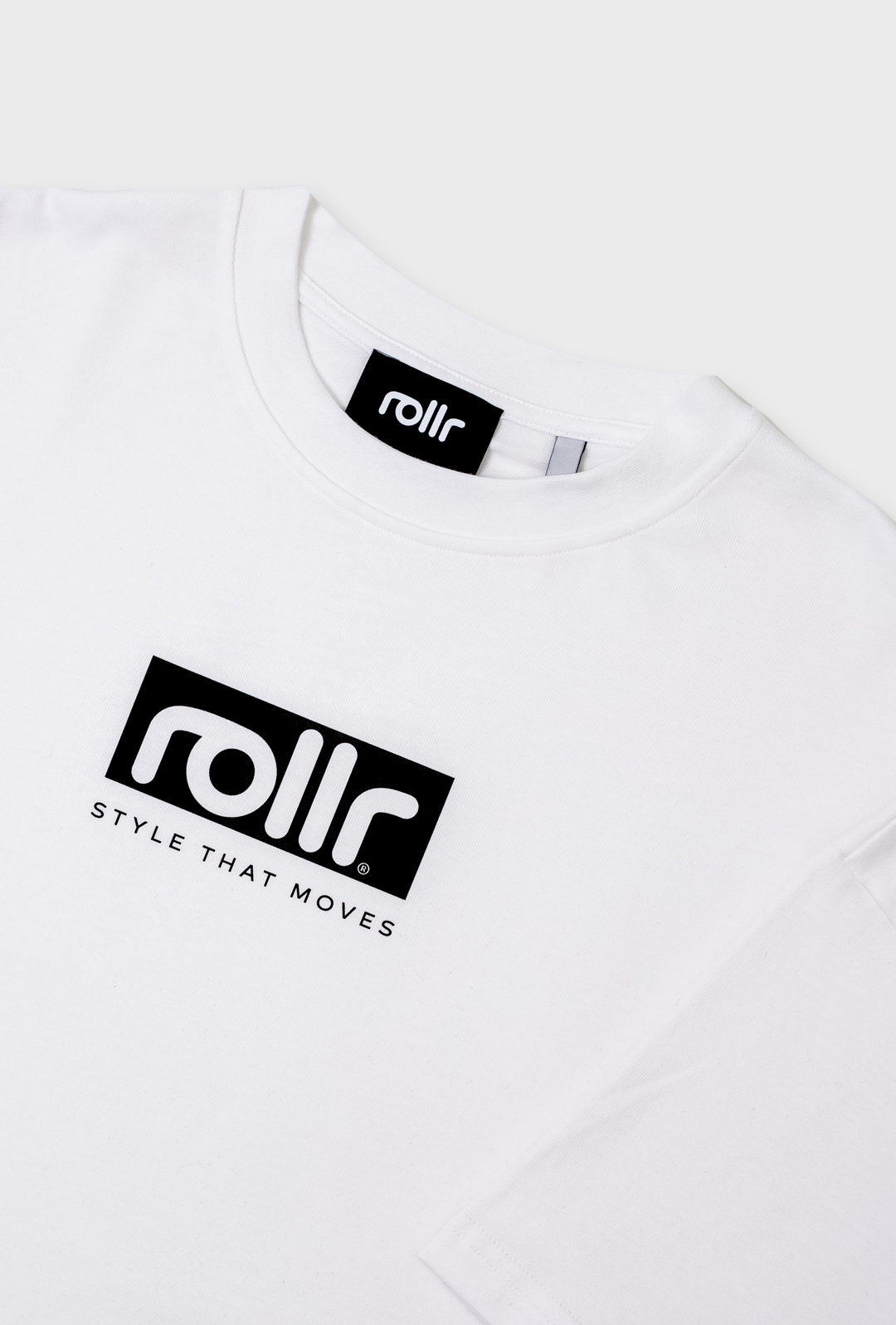 rollr clothing oversized polar white tshirt with rollr logo and style that mvoes tagline with rollr black label